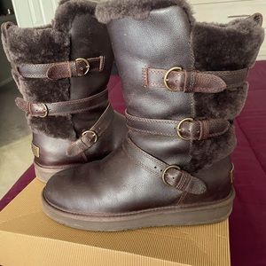 UGG Boots slightly worn. These boots are warm and are a Chocolate Brown color.